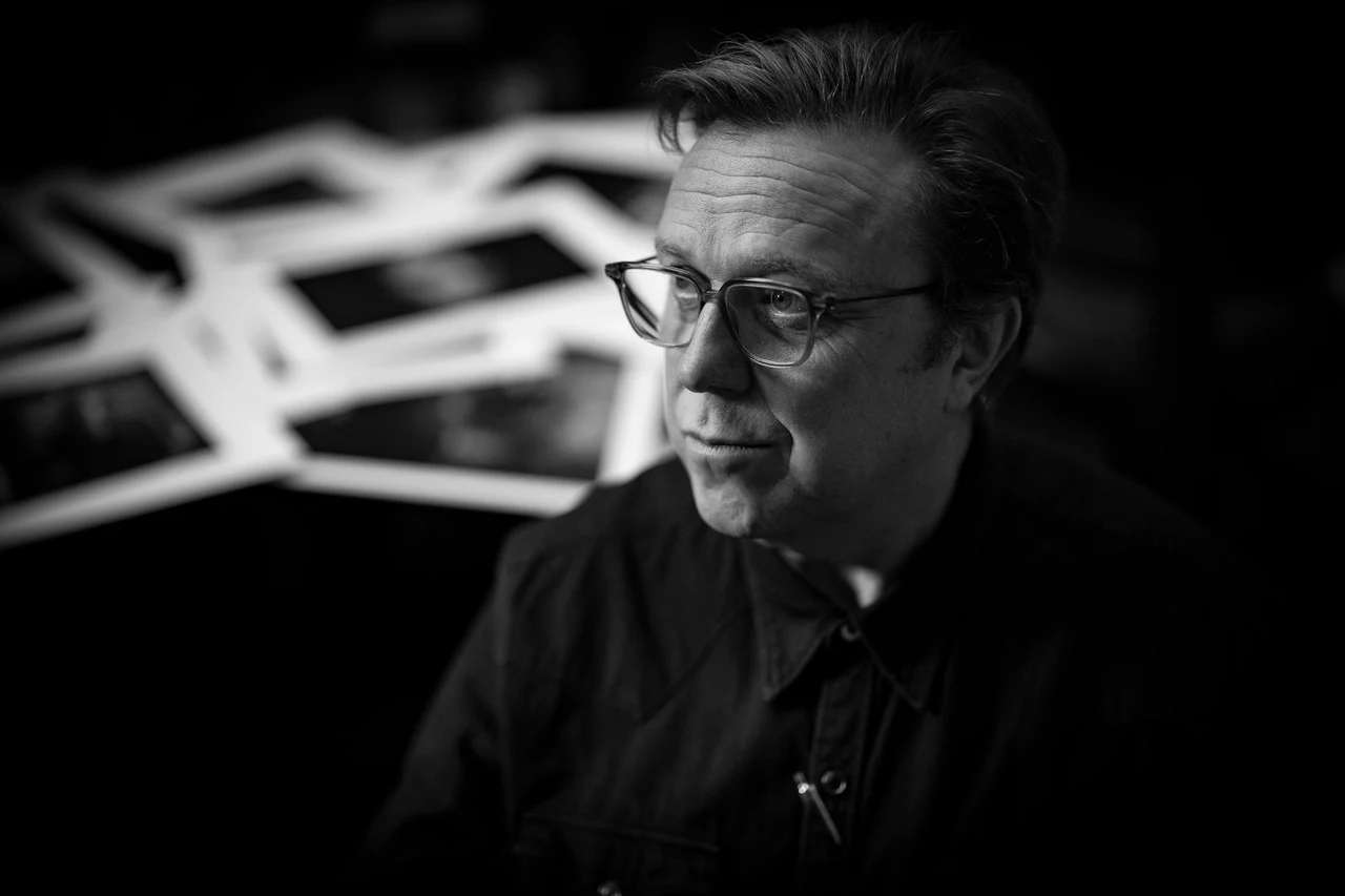 Black-and-white portrait of photographer Clive Booth