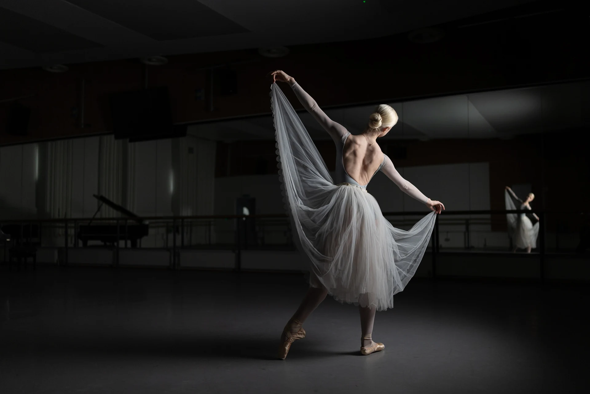 Dancer holding a flowing white veil